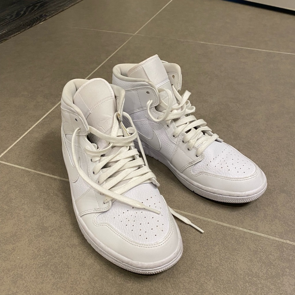 Jordan Nike Mid 1 2020 High Tops in white leather and patent leather.